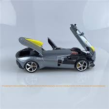 Bburago Ferrari Monza SP1 Silver Metallic with Yellow Stripes 1/18