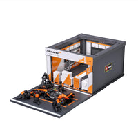 Bburago PIT STOP McLaren MCL39 (2025) #4 NORRIS – Official McLaren Racing Formula 1 Playset Diorama with 1:43 scale MCL39 vehicle