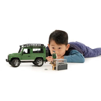 Bruder Land Rover Defender with Forester and Dog